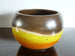 Helene large indoor plant pot, fiery orange and yellow wave on brown and beige